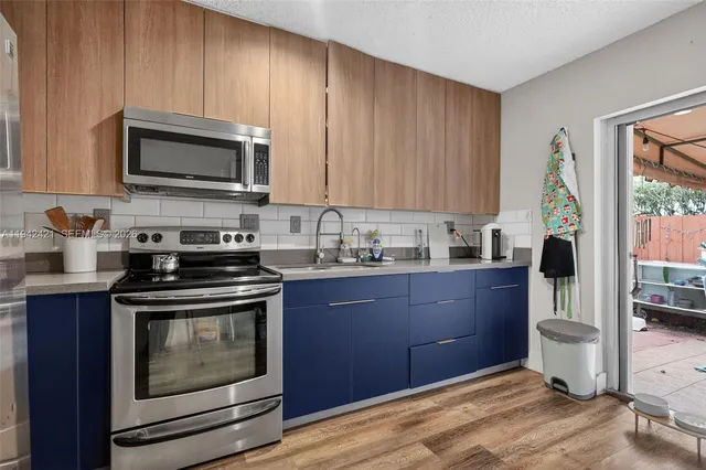 $445,000 | 18752 Northwest 84th Pl., Unit 6066, Hialeah, FL 33015