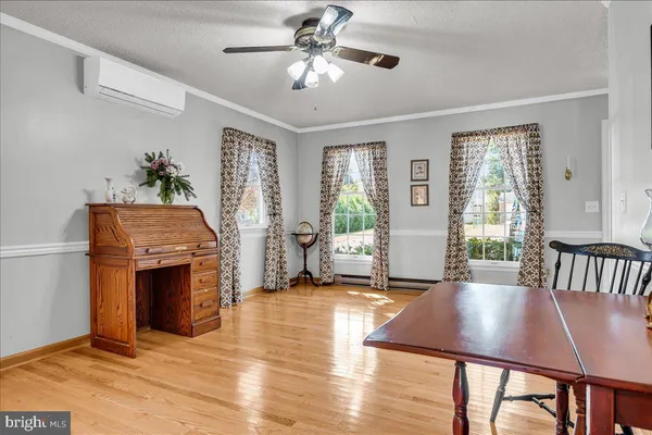 a livingroom with furniture window and wooden floor