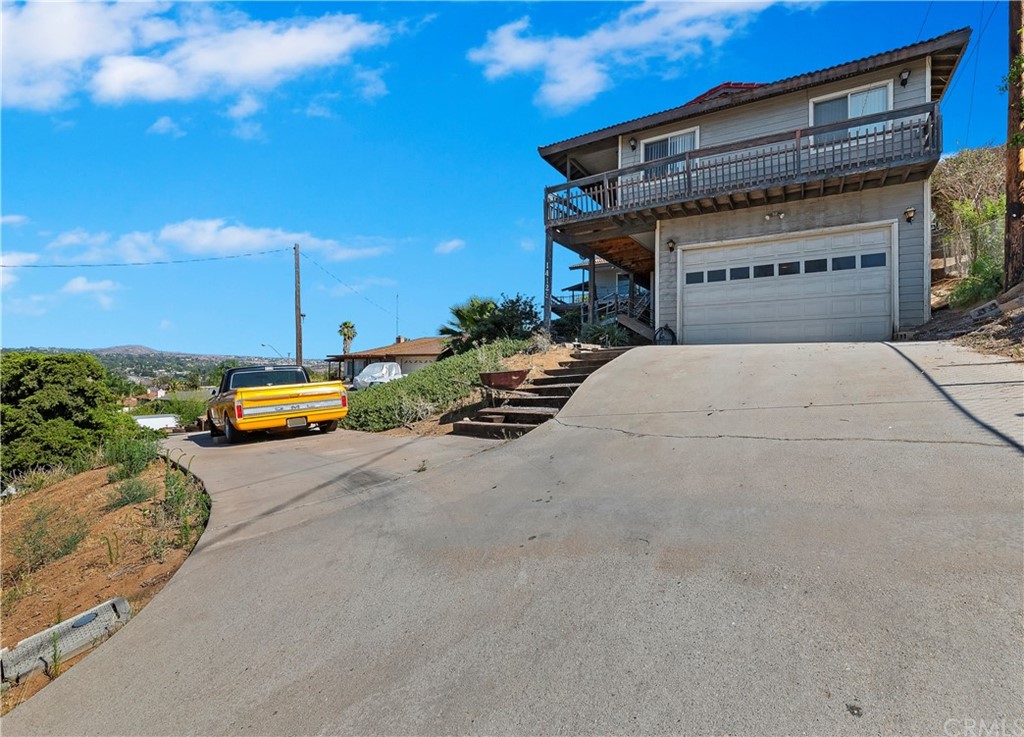 14123 El Mesa Drive Riverside, CA 92503 - Photo 1 of 1 a view of a street with cars