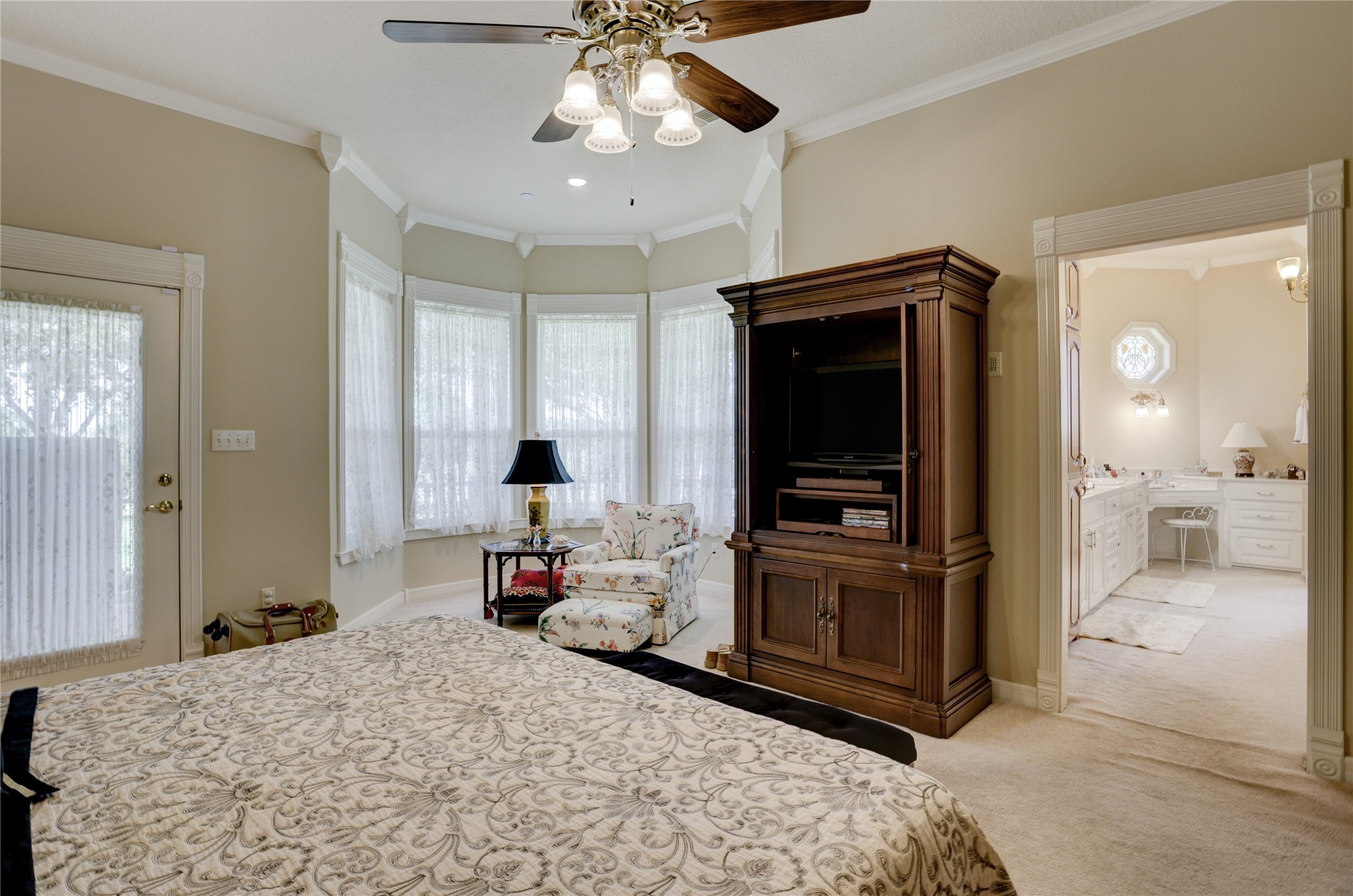 4854 Coshatte Road Bellville, TX 77418 - Photo 22 of 52 a bedroom with a bed and a view of bathroom