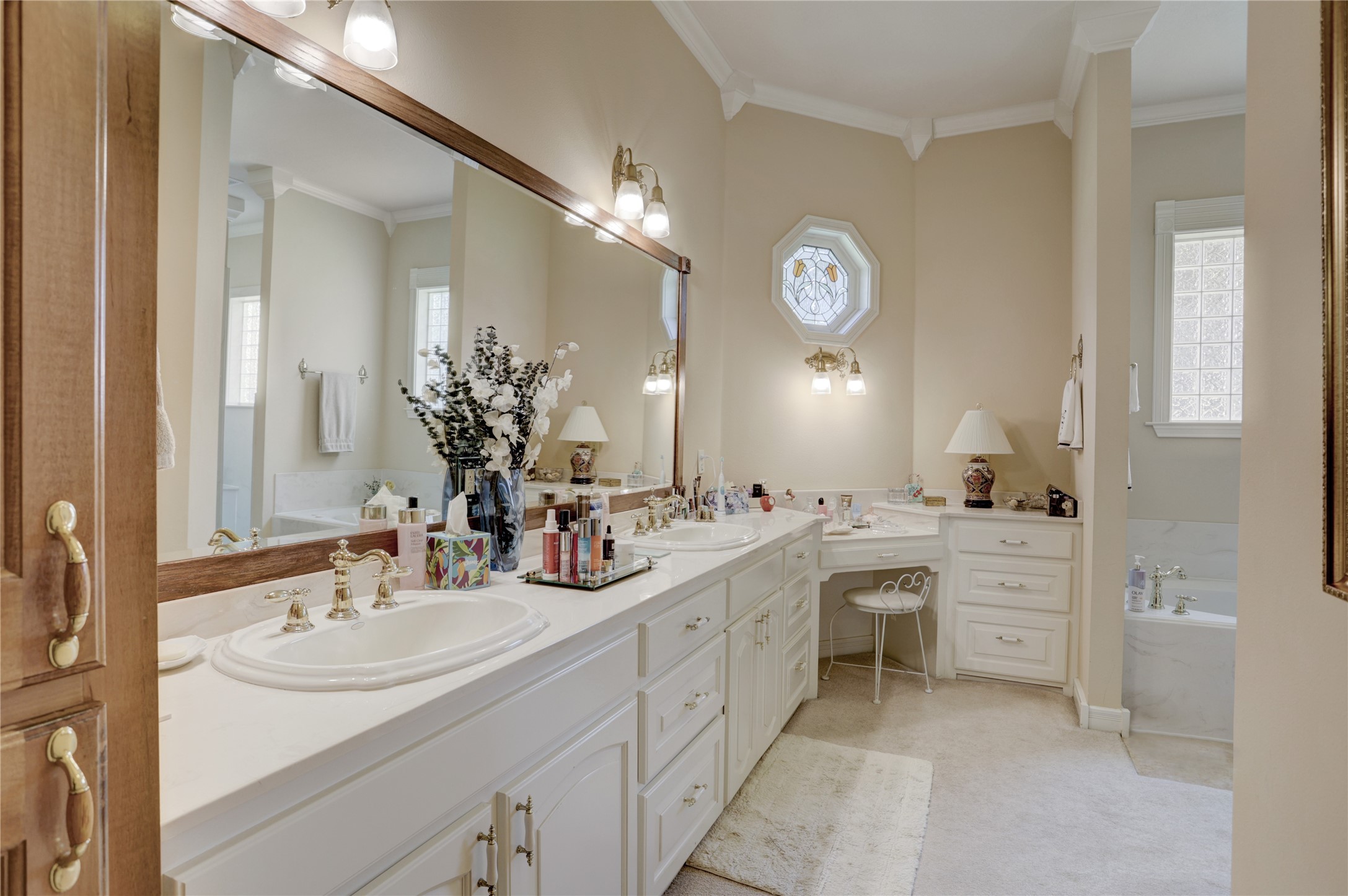 4854 Coshatte Road Bellville, TX 77418 - Photo 23 of 52 a bathroom with a sink vanity and a mirror