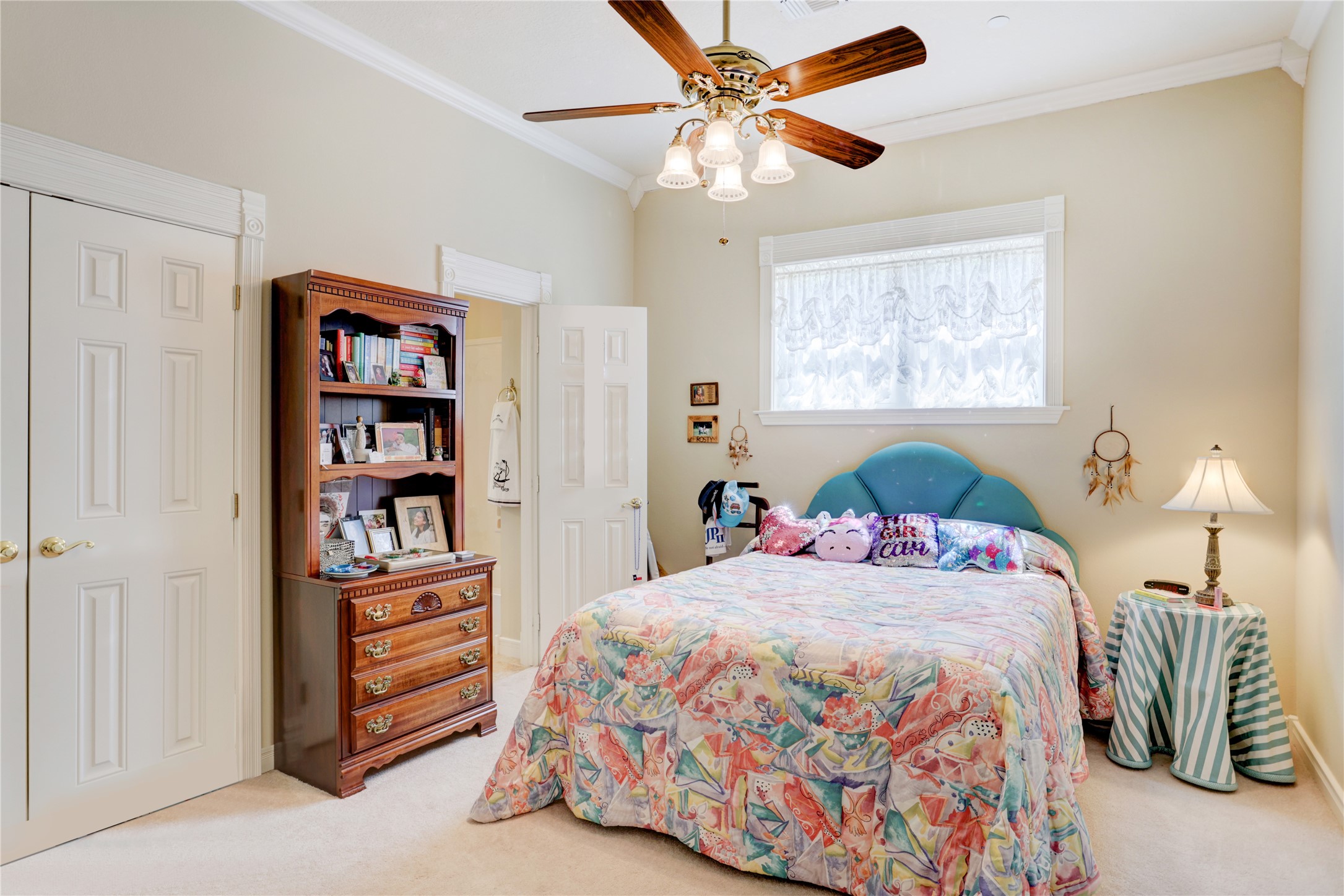 4854 Coshatte Road Bellville, TX 77418 - Photo 25 of 52 a bedroom with a bed dresser and a window