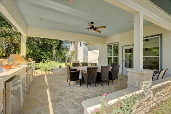 a view of a dining room with furniture window and outside view