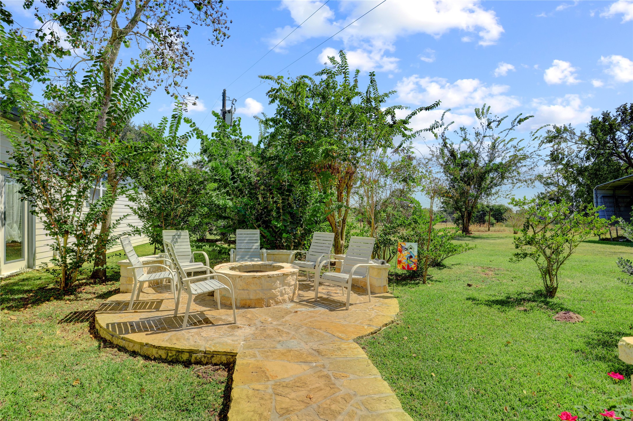 4854 Coshatte Road Bellville, TX 77418 - Photo 39 of 52 a view of a swimming pool with a patio