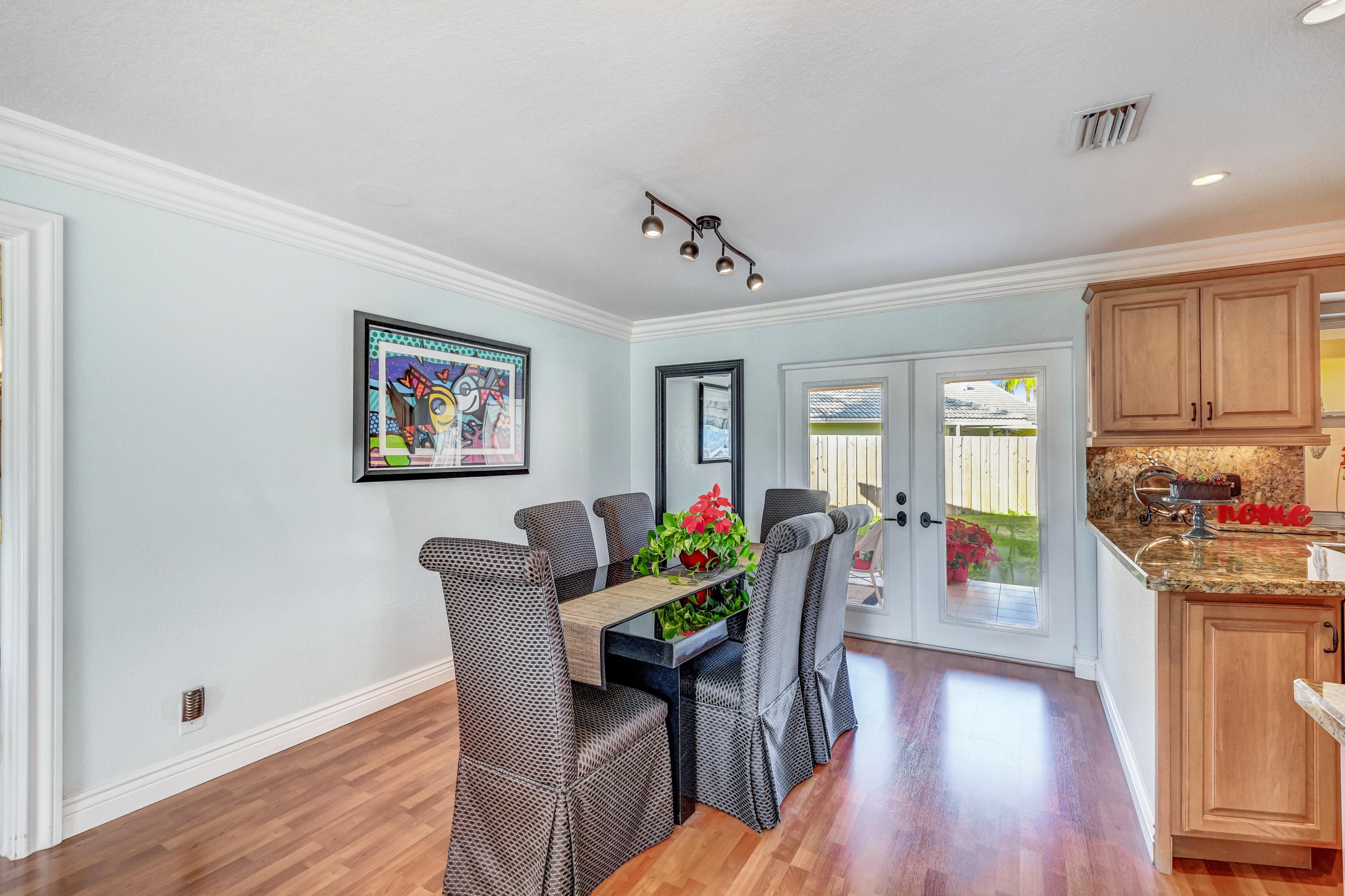 6871 Terra Tranquila Drive Boca Raton, FL 33433 - Photo 8 of 43 Dining Room Leads to Patio