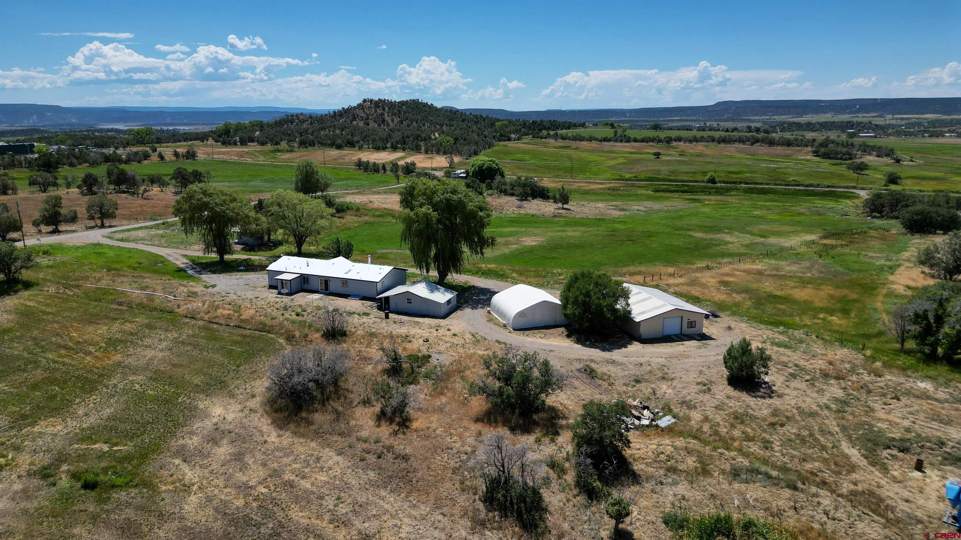 1019 County Road 330 Ignacio, CO 81137 - Photo 3 of 34 a view of a lake with a mountain in the background