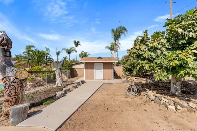 a view of a yard and mountain