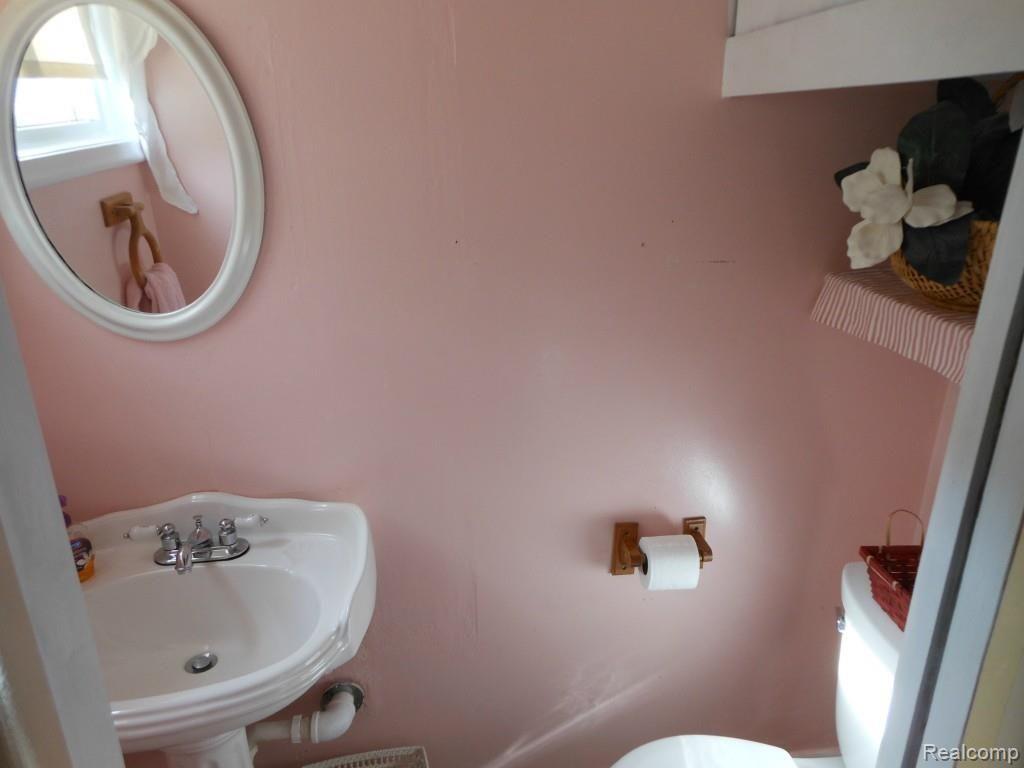 8359 Dale Center Line, MI 48015 - Photo 11 of 13 Cute half bath (lav).
