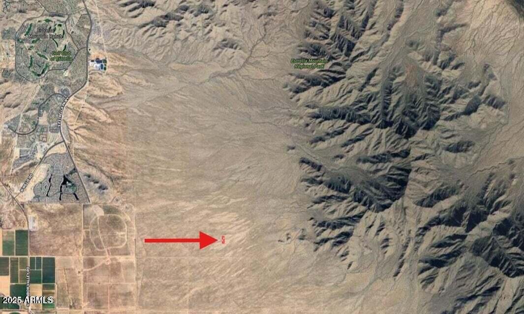 0 Rainbow Valley, Unit 6 Goodyear, AZ 85338 - Photo 3 of 4 a outdoor space with lots of trees in the background