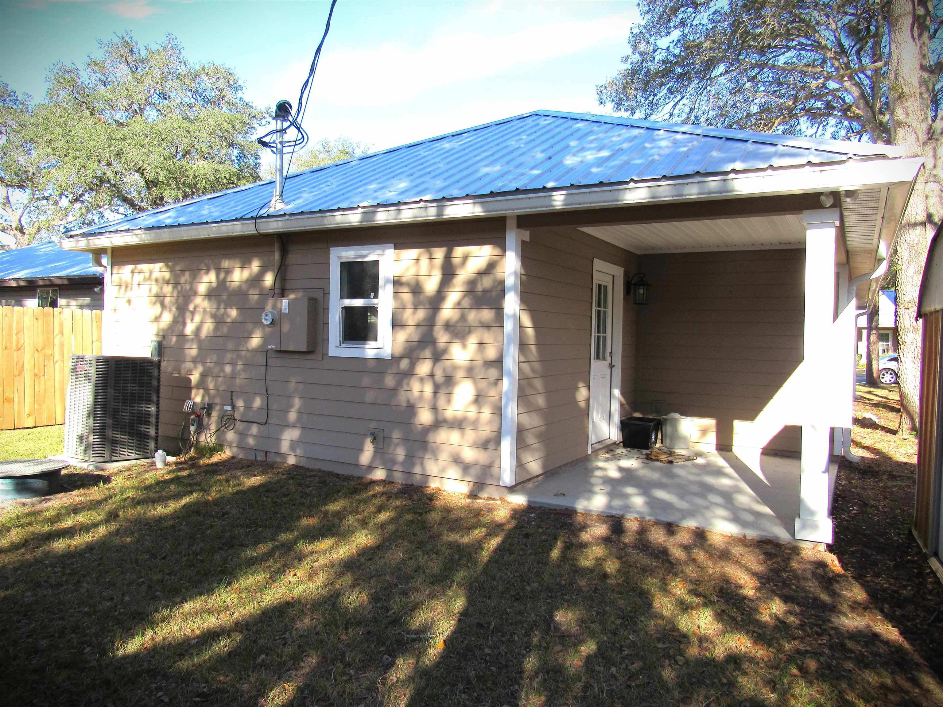3347 7th Street Elkton, FL 32033 - Photo 2 of 17 a view of a house with backyard
