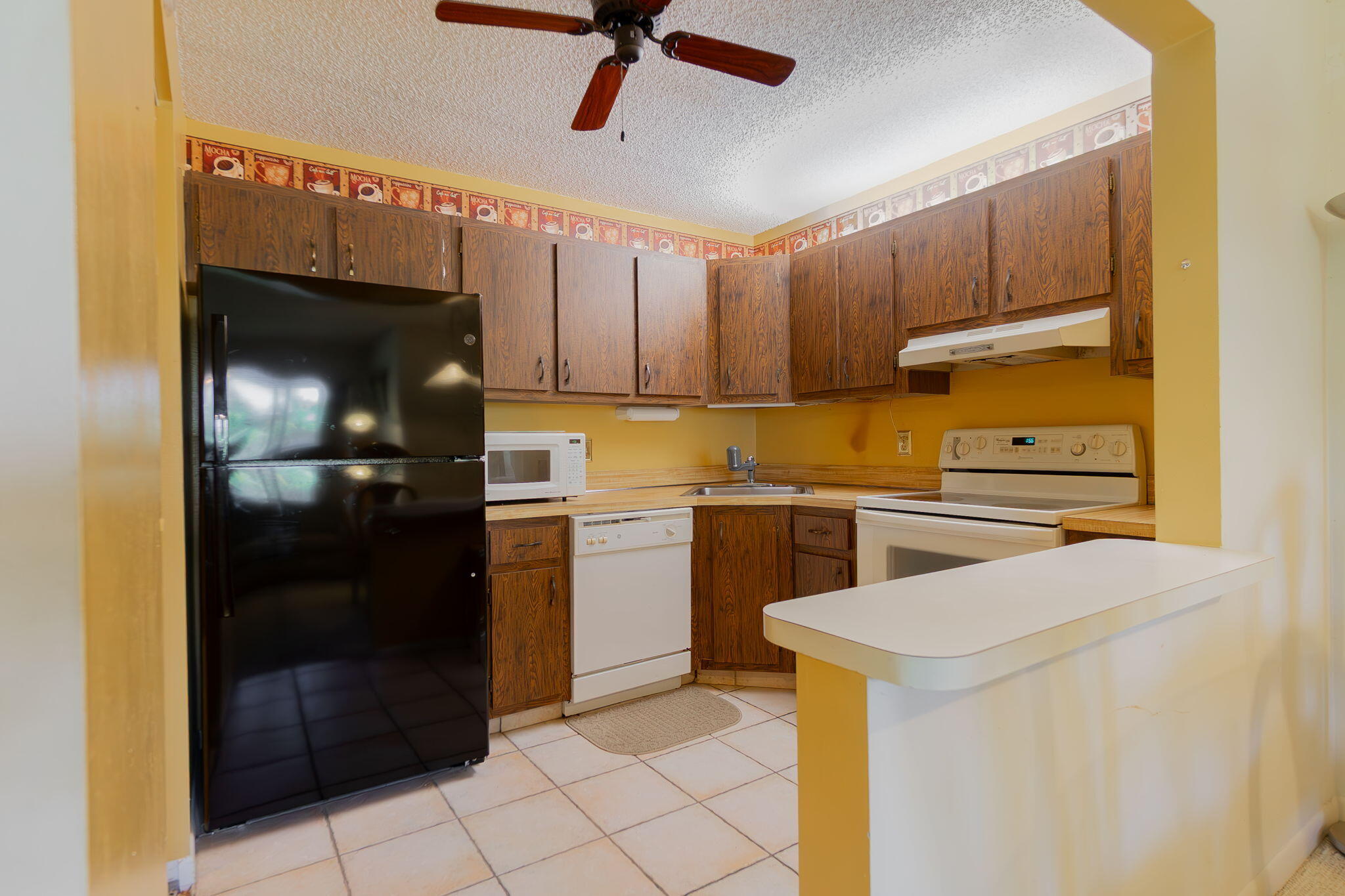 318 Pine Ridge Circle, Unit C2 Greenacres, FL 33463 - Photo 12 of 30 Kitchen