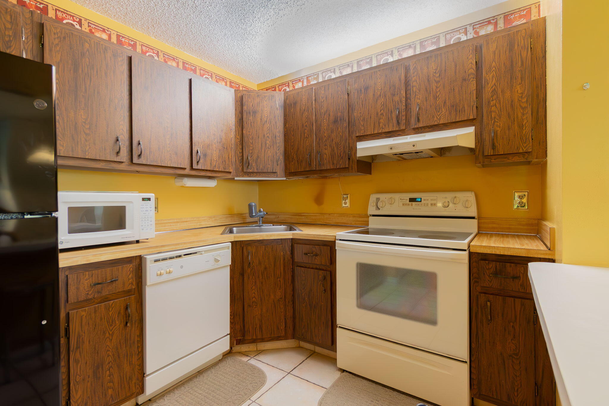 318 Pine Ridge Circle, Unit C2 Greenacres, FL 33463 - Photo 13 of 30 Kitchen