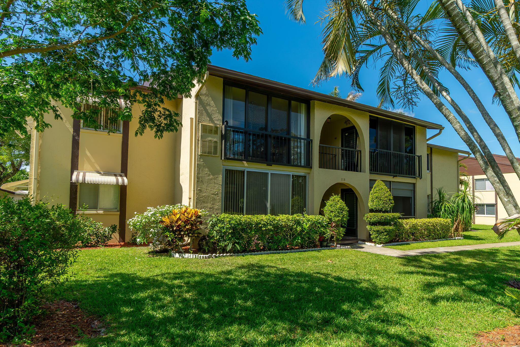 318 Pine Ridge Circle, Unit C2 Greenacres, FL 33463 - Photo 2 of 30 Front