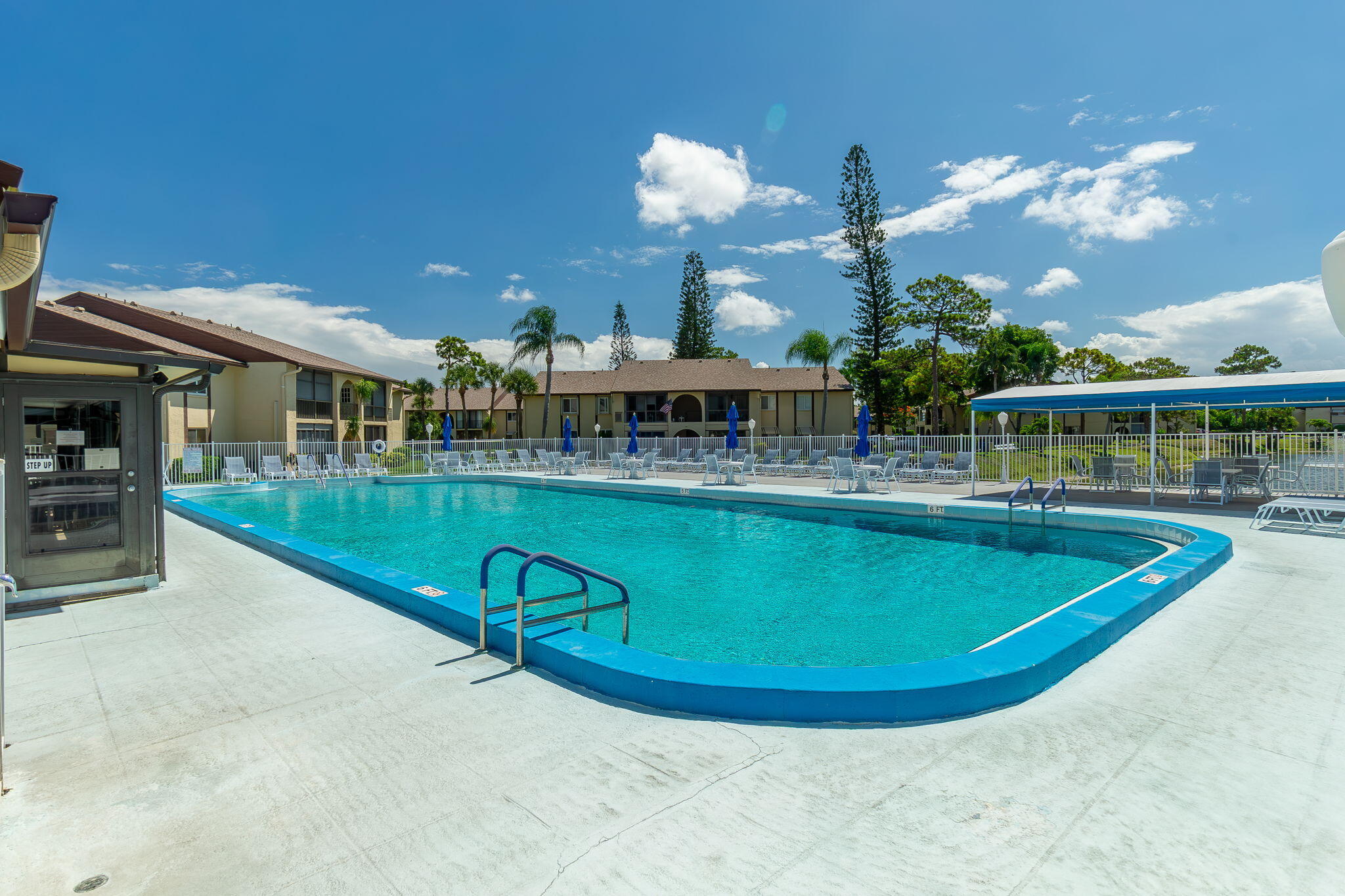 318 Pine Ridge Circle, Unit C2 Greenacres, FL 33463 - Photo 25 of 30 Community Pool