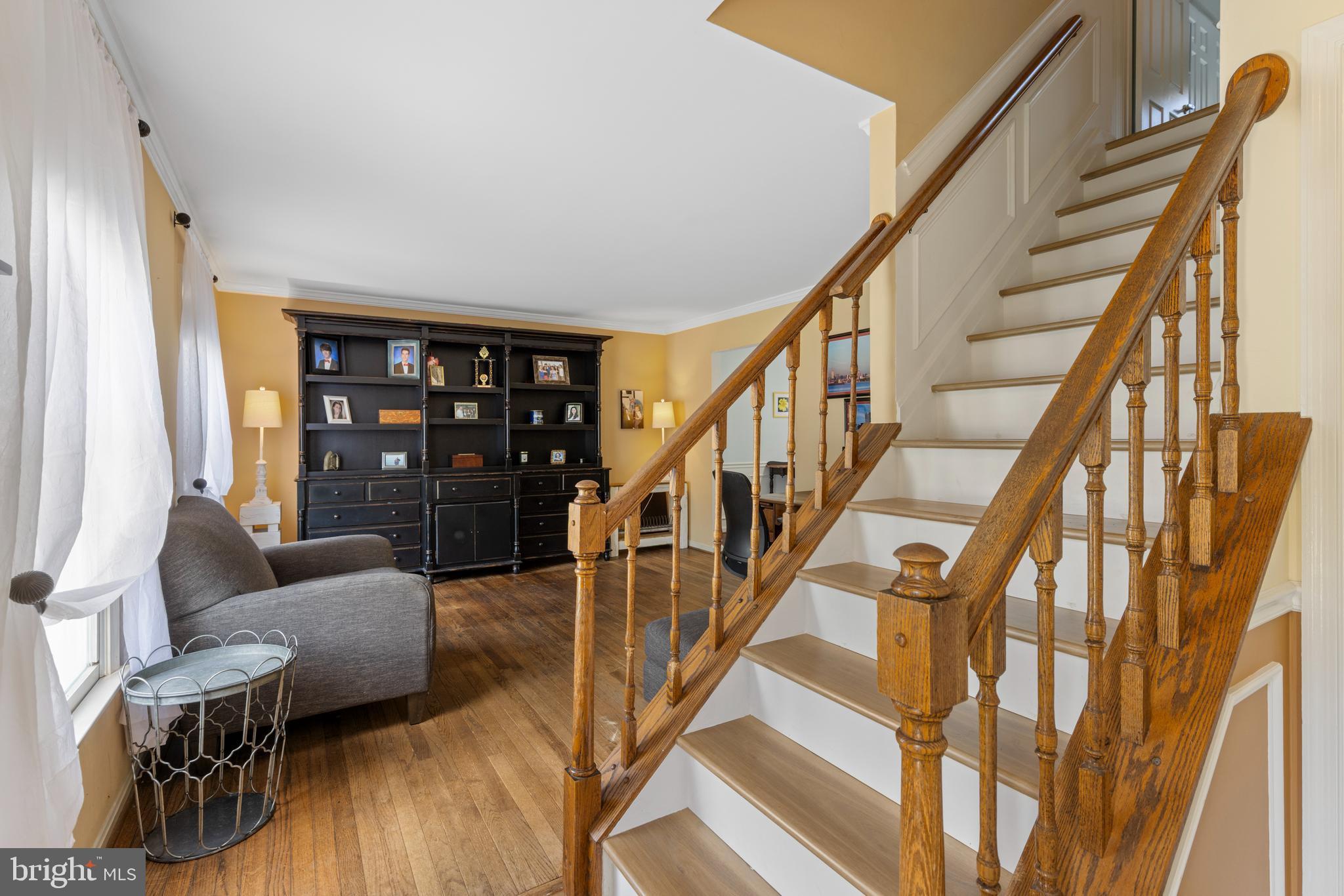 9209 Ramblebrook Road Baltimore, MD 21236 - Photo 22 of 54 a view of entryway and hall with wooden floor