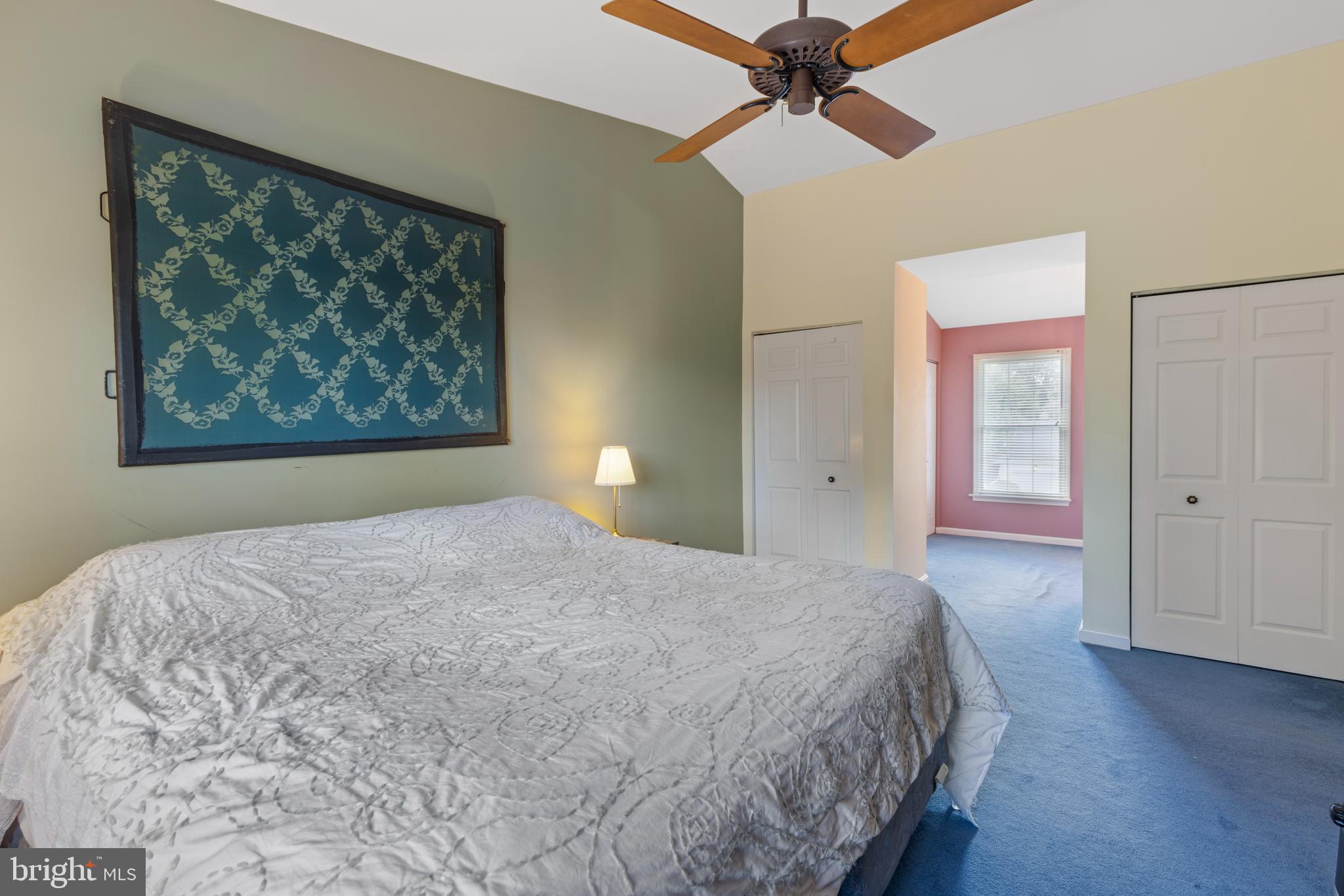 9209 Ramblebrook Road Baltimore, MD 21236 - Photo 25 of 54 a bedroom with a large bed and a window