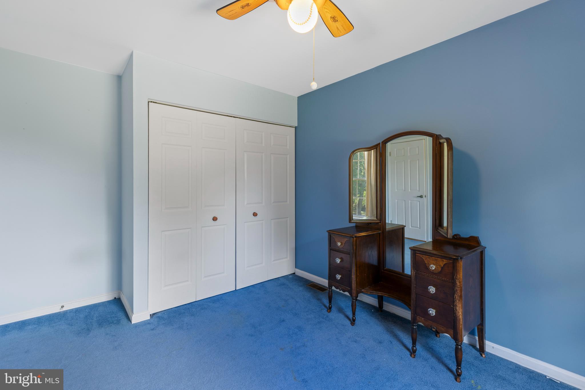 9209 Ramblebrook Road Baltimore, MD 21236 - Photo 34 of 54 a room with furniture and wooden floor
