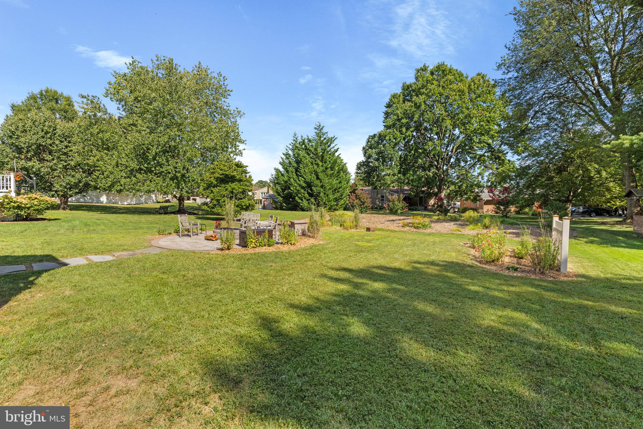 9209 Ramblebrook Road Baltimore, MD 21236 - Photo 54 of 54 a view of a swimming pool with an outdoor space and seating area