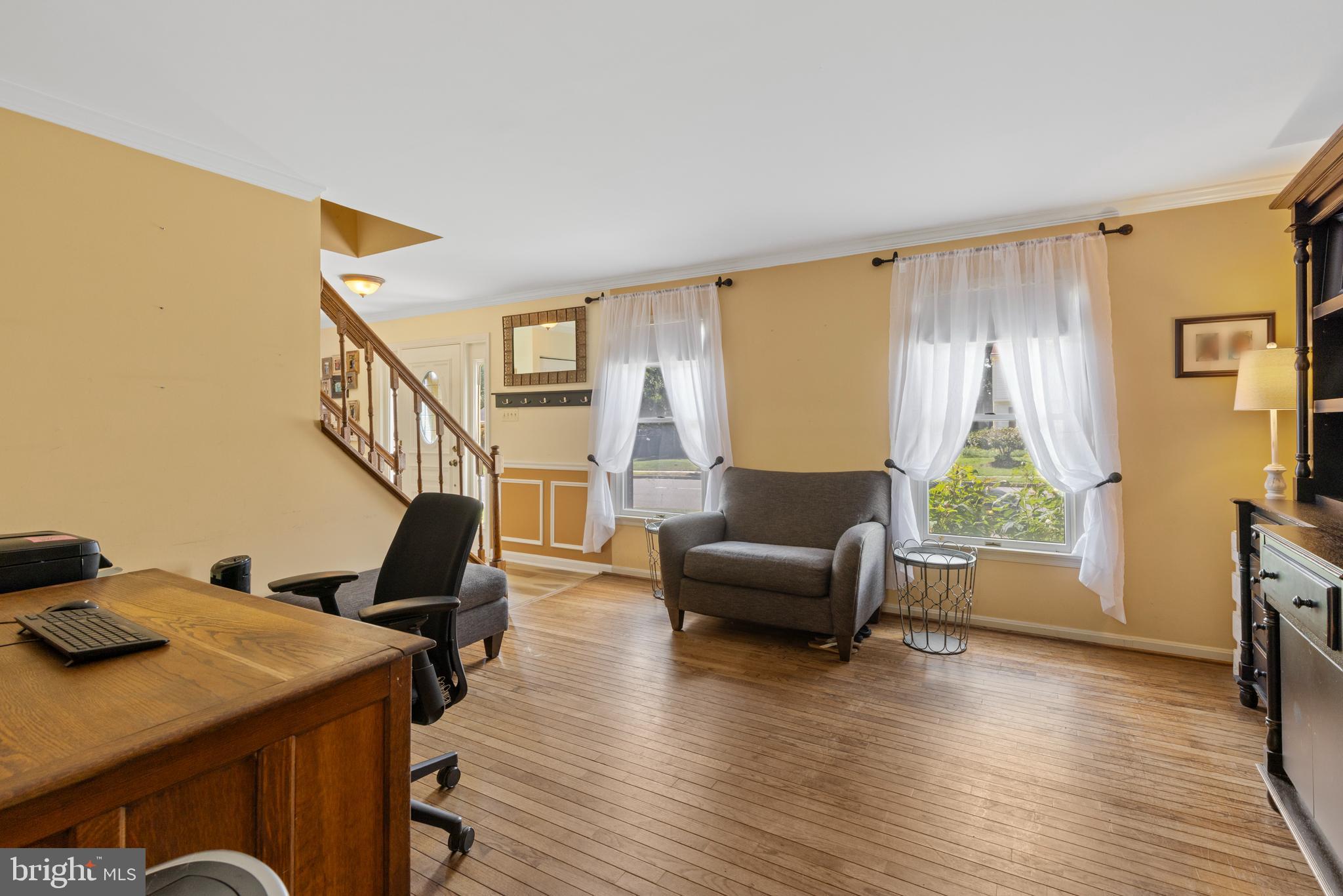 9209 Ramblebrook Road Baltimore, MD 21236 - Photo 7 of 54 a livingroom with furniture wooden floor and windows