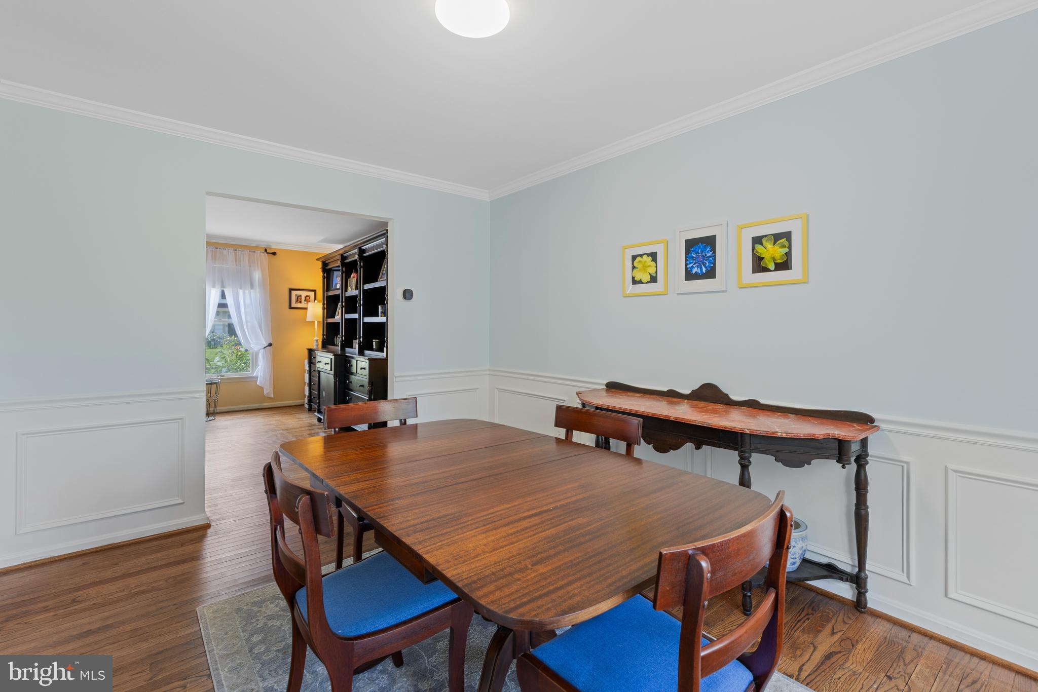 9209 Ramblebrook Road Baltimore, MD 21236 - Photo 9 of 54 a view of a dining room with furniture and wooden floor