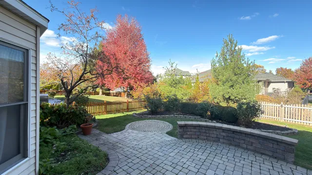 a view of a garden with a fountain
