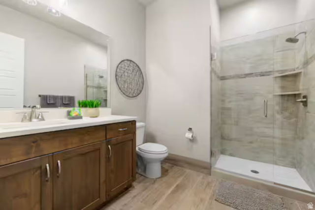 2600 Ocotillo Way, Unit 56 Santa Clara, UT 84765 - Photo 16 of 33 Full bath featuring vanity, a shower stall, and light wood-style flooring