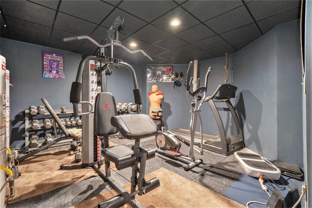 1059 Concerto Court Fairburn, GA 30213 - Photo 11 of 14 a view of a room with gym equipment