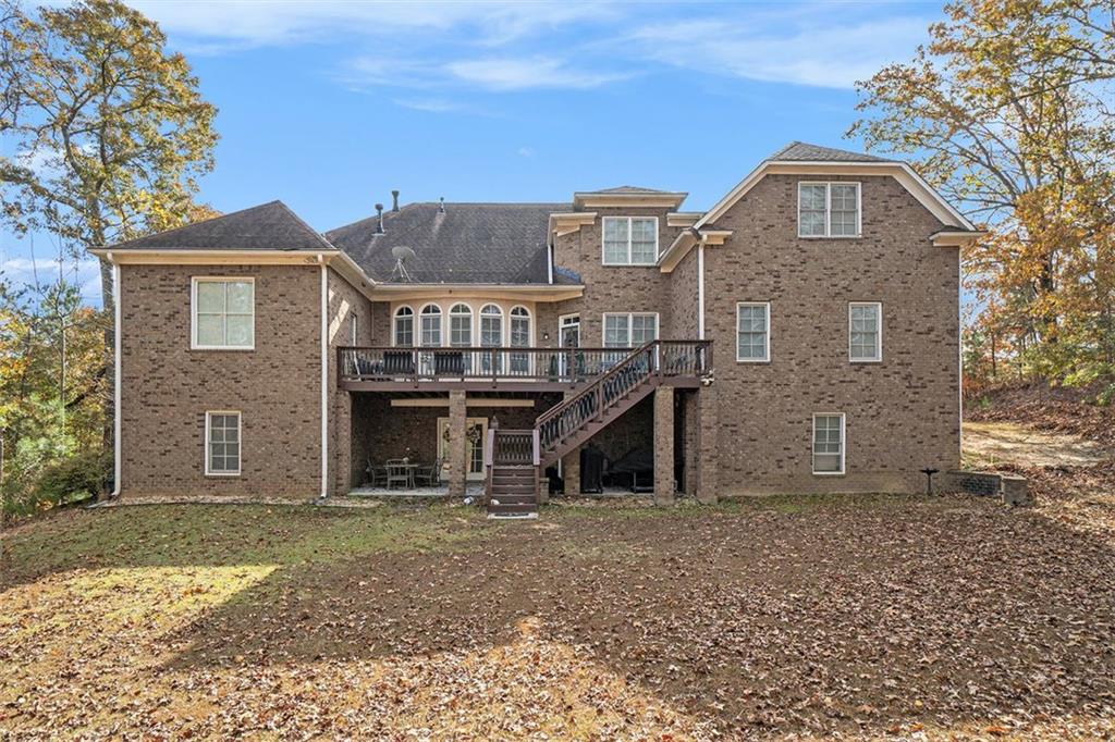 1059 Concerto Court Fairburn, GA 30213 - Photo 13 of 14 a front view of a house with a yard