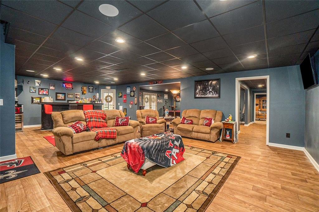 1059 Concerto Court Fairburn, GA 30213 - Photo 7 of 14 a living room with lots of furniture and a table