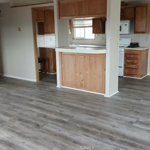 a view of an empty room with shelves