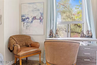 7625 East Camelback Road, Unit B228 Scottsdale, AZ 85251 - Photo 19 of 24 a living room with furniture and window