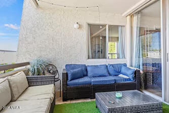 7625 East Camelback Road, Unit B228 Scottsdale, AZ 85251 - Photo 20 of 24 a living room with furniture and a window