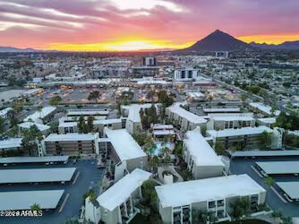 7625 East Camelback Road, Unit B228 Scottsdale, AZ 85251 - Photo 22 of 24 a view of a city from a terrace