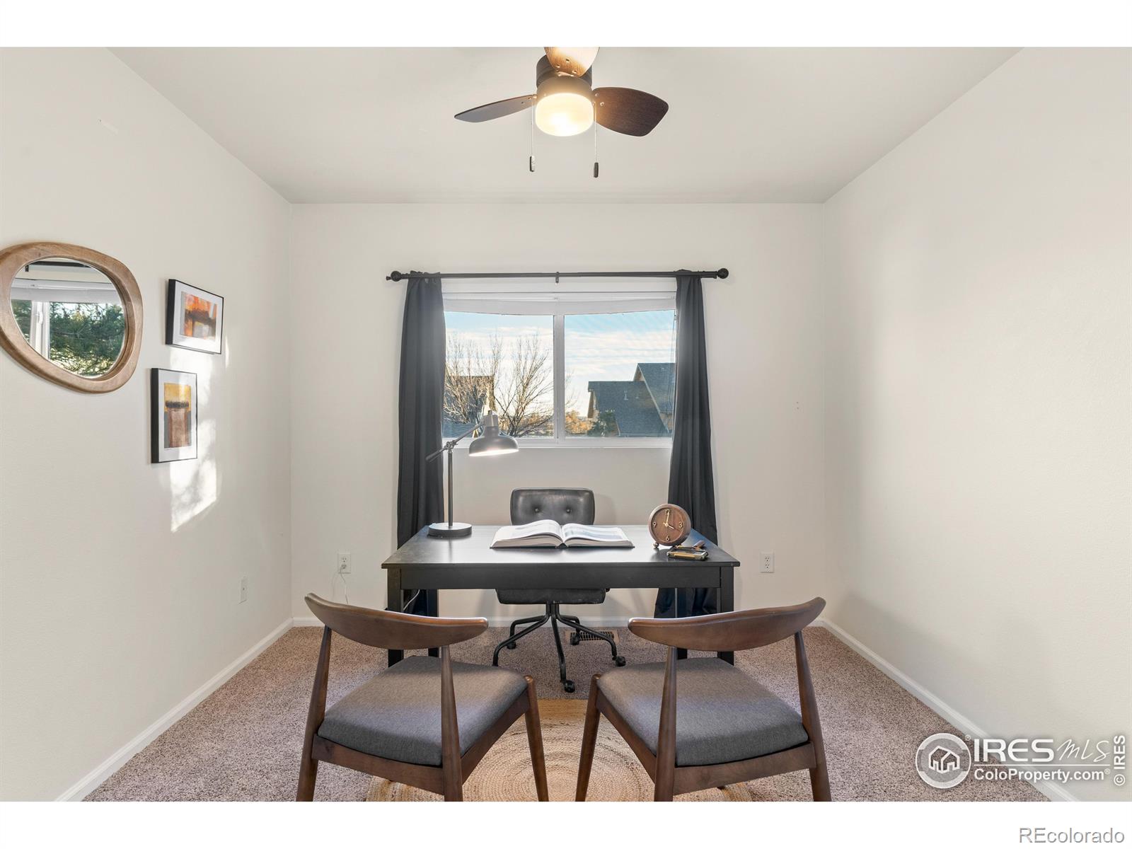 2900 Purcell Street, Unit O4 Brighton, CO 80601 - Photo 6 of 28 a dining room with furniture and a window