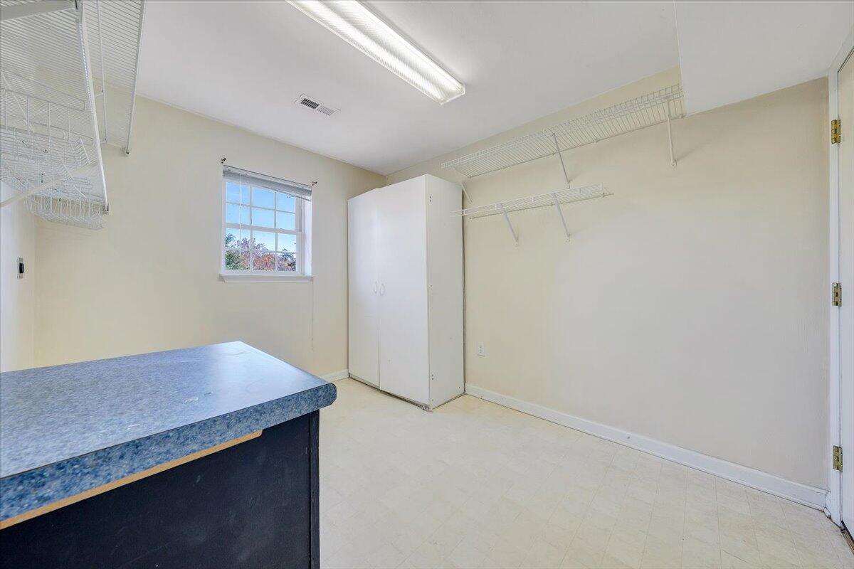 6717 Albert Road Roanoke, VA 24019 - Photo 17 of 48 a view of storage and utility room with a hallway