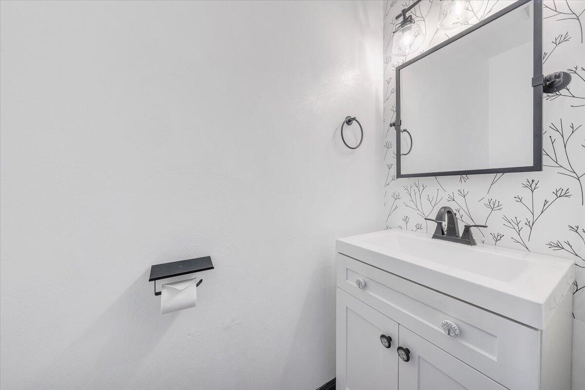 6717 Albert Road Roanoke, VA 24019 - Photo 20 of 48 a bathroom with a sink and a mirror