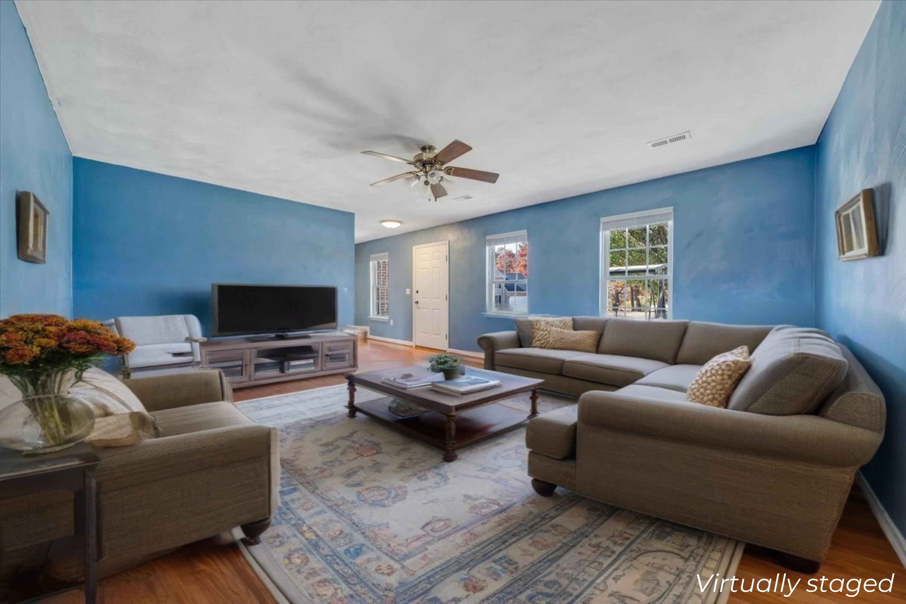 6717 Albert Road Roanoke, VA 24019 - Photo 2 of 48 a living room with furniture and a flat screen tv