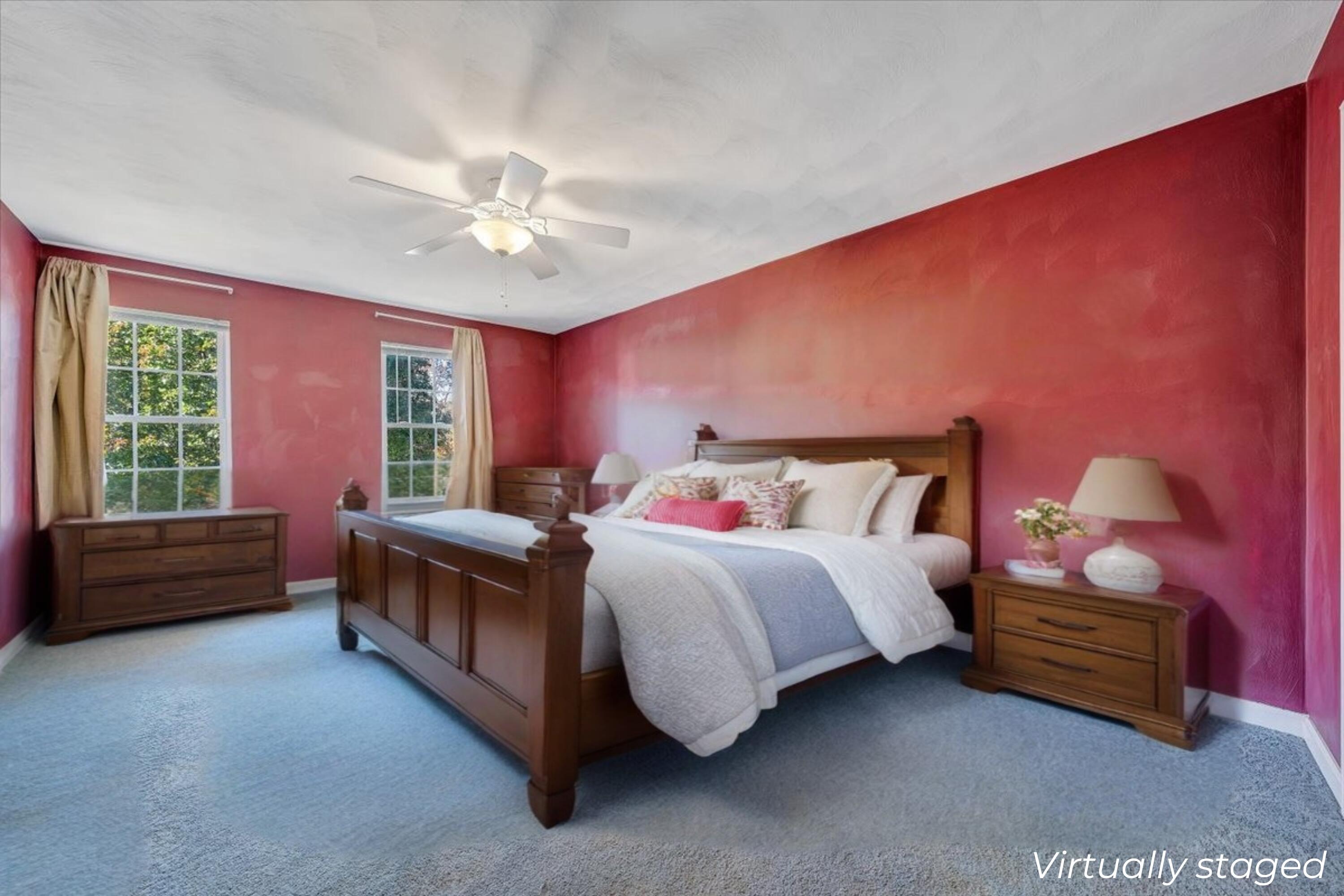 6717 Albert Road Roanoke, VA 24019 - Photo 22 of 48 a spacious bedroom with a bed and a chandelier