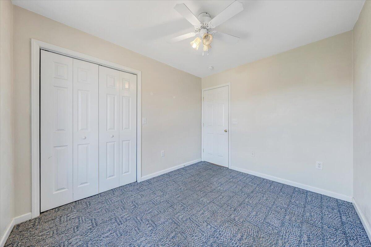 6717 Albert Road Roanoke, VA 24019 - Photo 31 of 48 an empty room with a ceiling fan