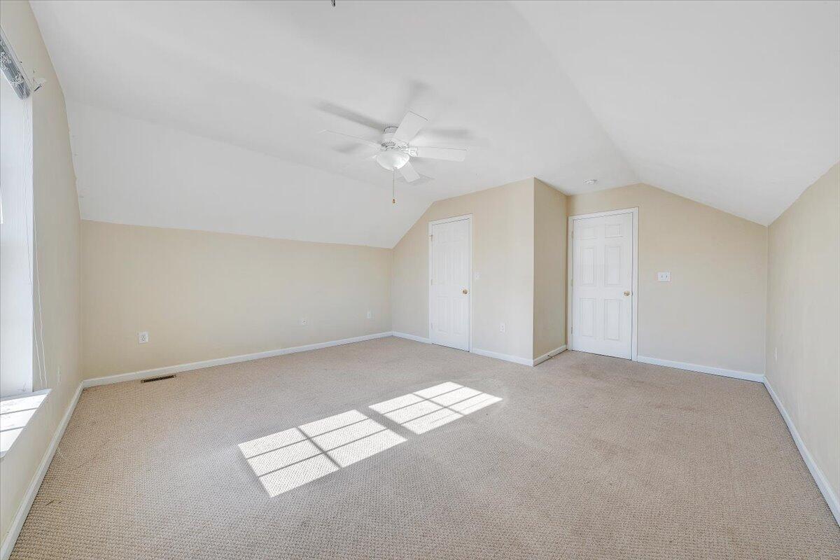 6717 Albert Road Roanoke, VA 24019 - Photo 33 of 48 an empty room with windows and fan