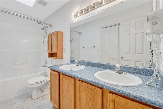 a view of a balcony with wooden floor