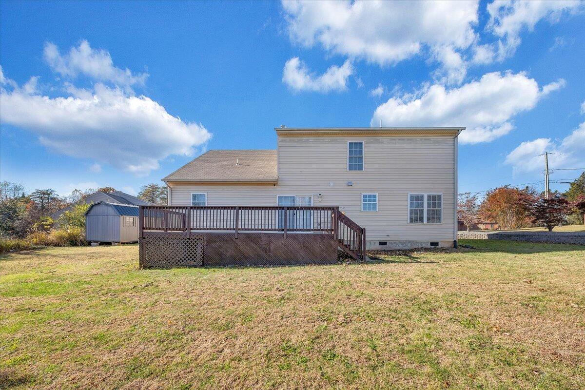 6717 Albert Road Roanoke, VA 24019 - Photo 42 of 48 a view of a house with a yard
