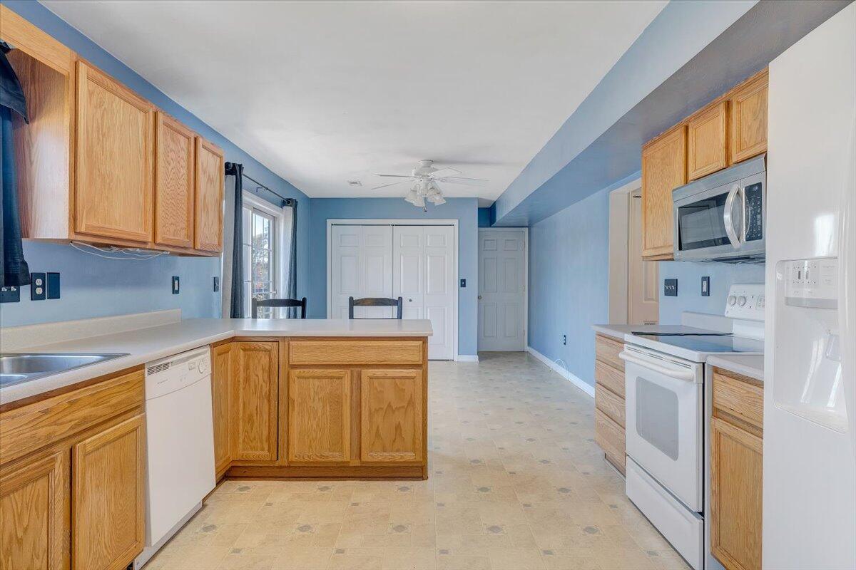 6717 Albert Road Roanoke, VA 24019 - Photo 10 of 48 a kitchen with stainless steel appliances granite countertop a stove a sink and a refrigerator