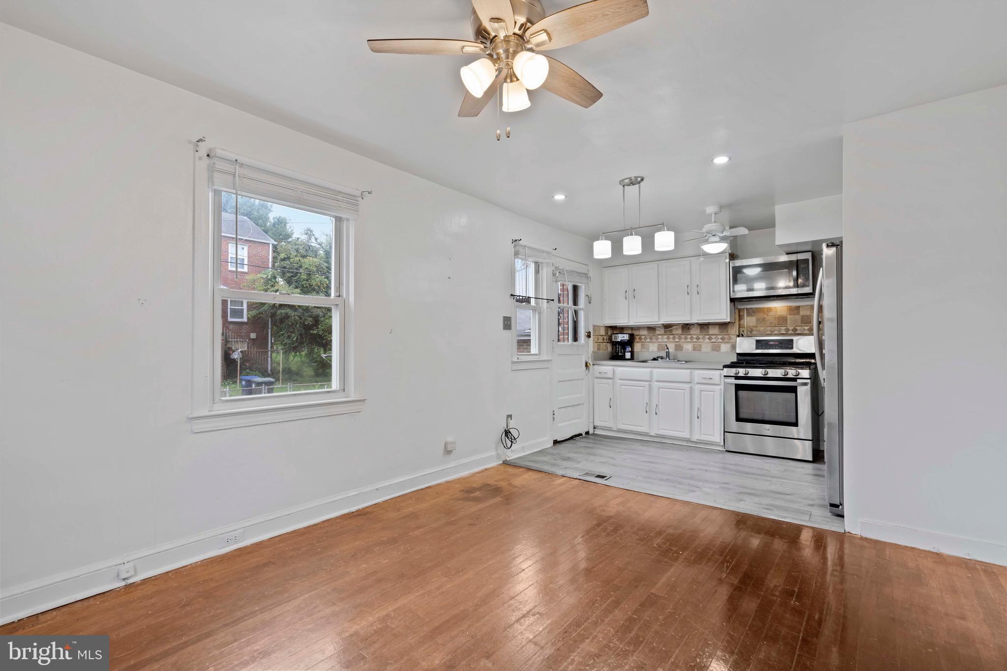 1915 Ridge Place Southeast Washington, DC 20020 - Photo 11 of 28 Dining Room - Open to Kitchen