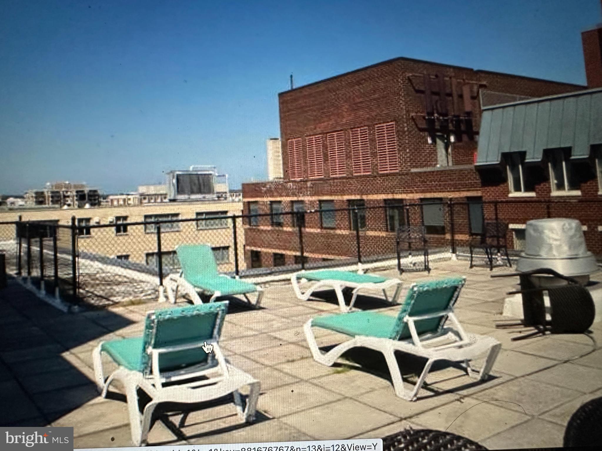 522 21st Street Northwest, Unit 1003 Washington, DC 20037 - Photo 11 of 15 a building outdoor space with patio furniture and potted plants