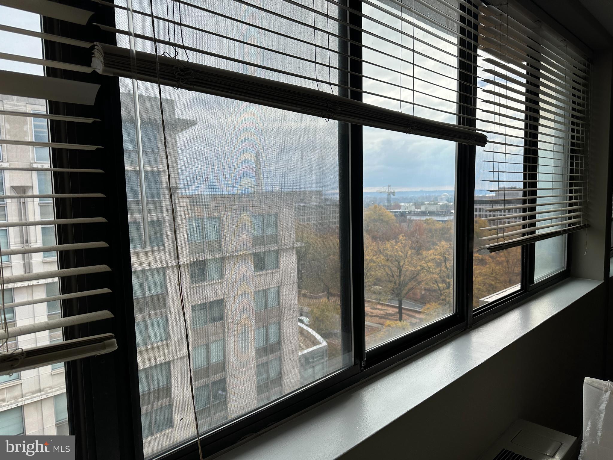 522 21st Street Northwest, Unit 1003 Washington, DC 20037 - Photo 6 of 15 a view of empty room with windows