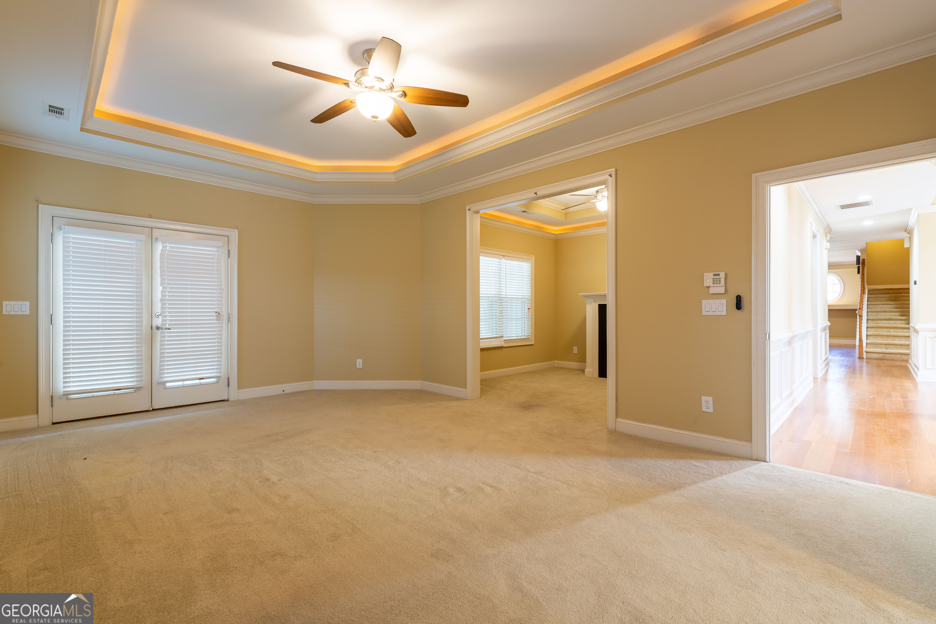 3194 Liverpool Street Jonesboro, GA 30236 - Photo 16 of 44 a view of a livingroom with a chandelier fan and a chandelier fan