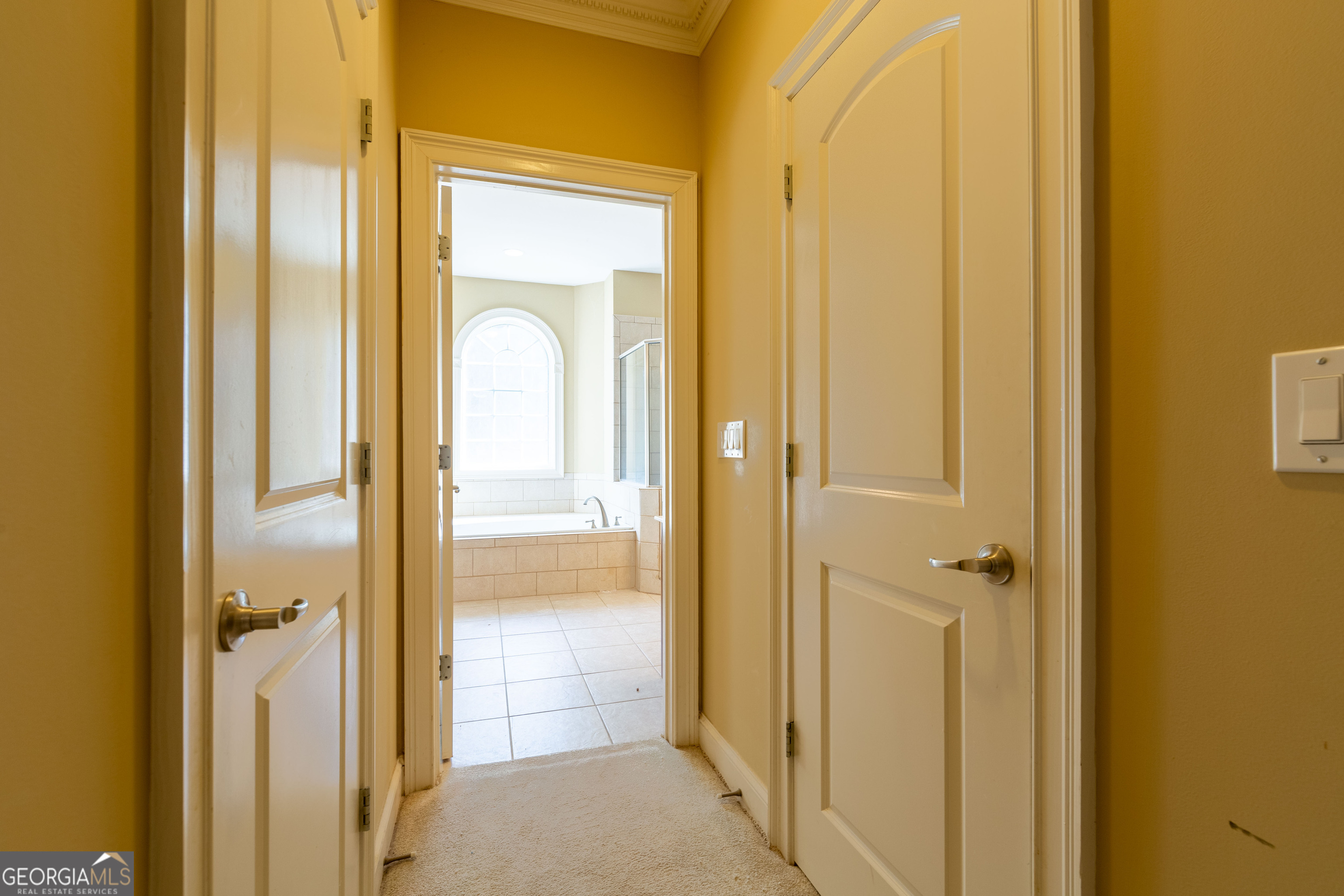 3194 Liverpool Street Jonesboro, GA 30236 - Photo 19 of 44 a view of a bathroom from a hallway