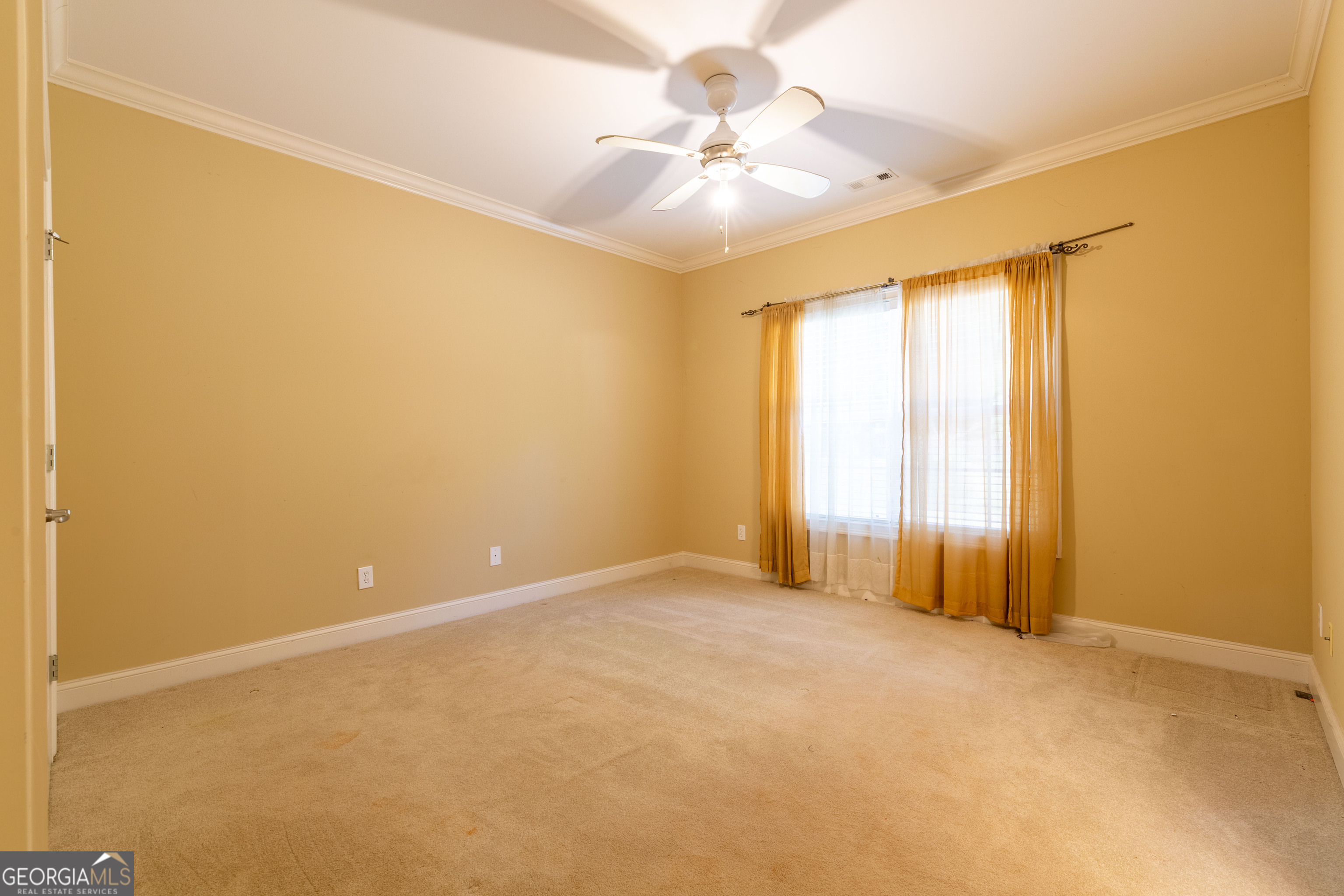 3194 Liverpool Street Jonesboro, GA 30236 - Photo 29 of 44 a view of an empty room with a window