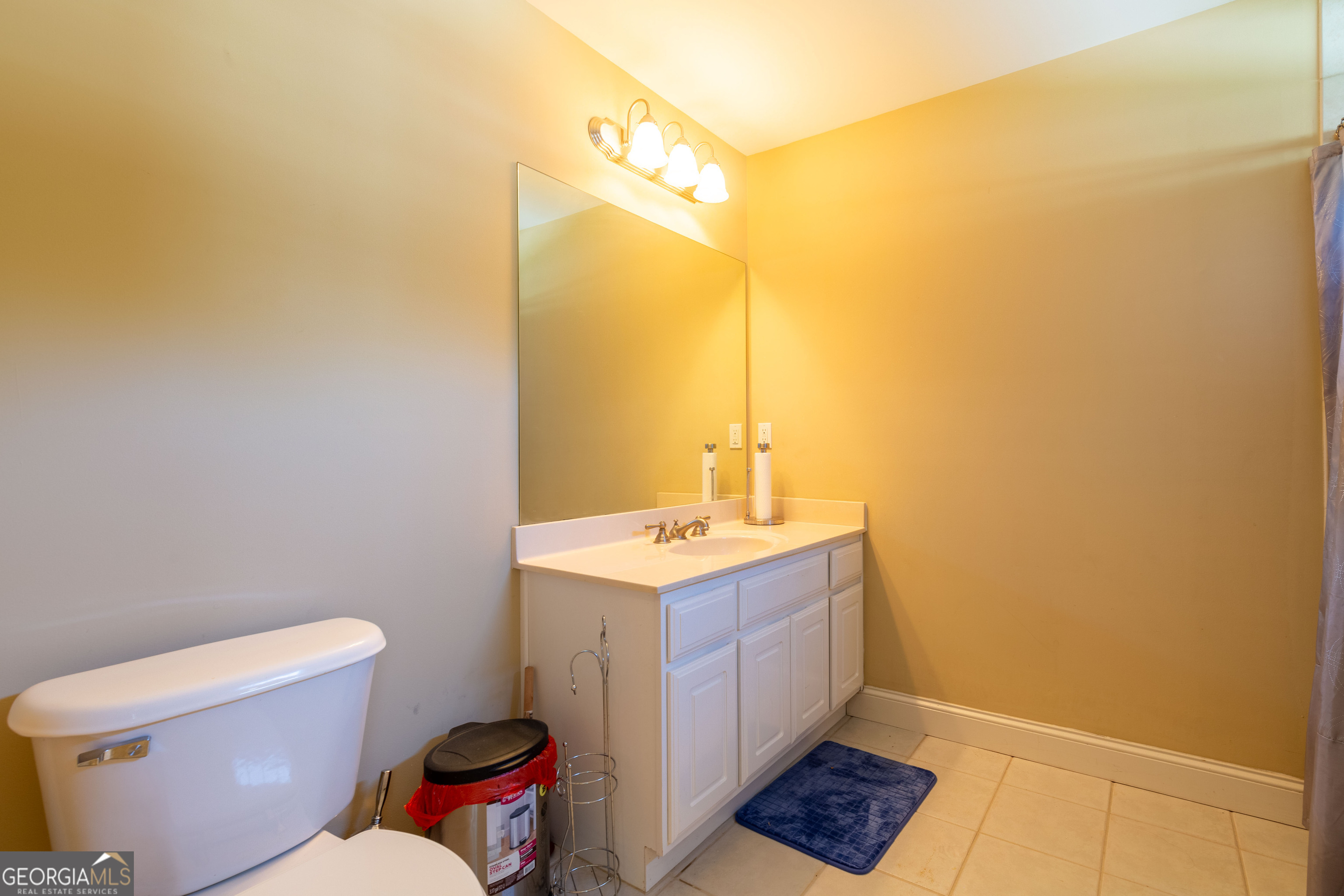 3194 Liverpool Street Jonesboro, GA 30236 - Photo 38 of 44 a bathroom with a sink and a toilet